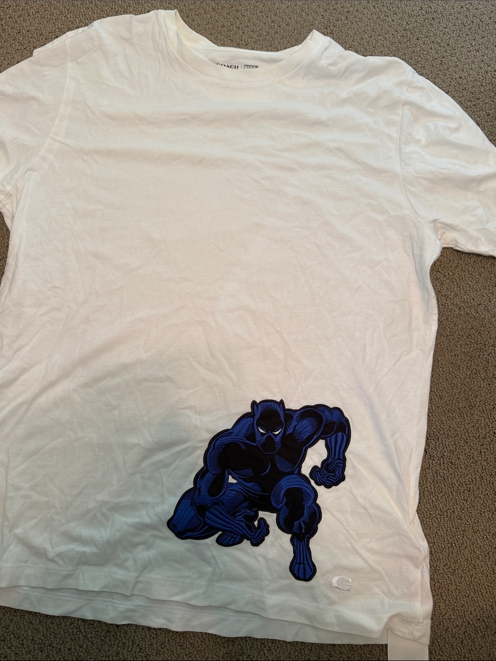 Coach White T-Shirt with Blue Black Panther Graphic